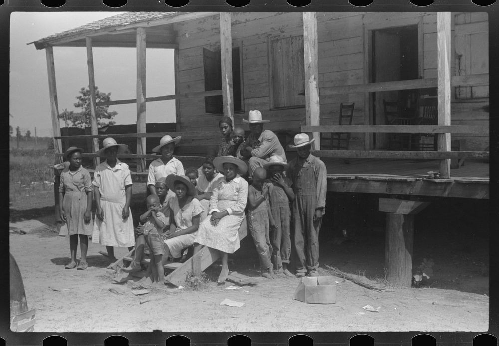 [Untitled photo, possibly related to: Public health doctor giving tenant family medicine for malaria, near Columbia, South…