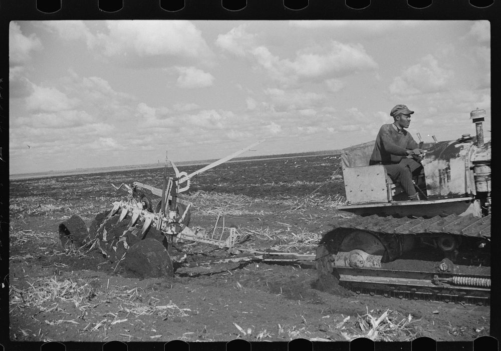 Discing the land before planting sugarcane for United States Sugar Corporation near Clewistown, Florida. Sourced from the…
