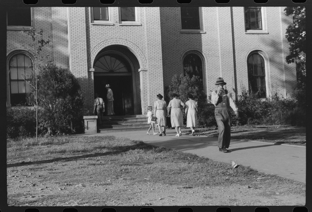 [Untitled photo, possibly related to: Visiting in front of courthouse on Saturday afternoon, Lexington, Mississippi Delta…