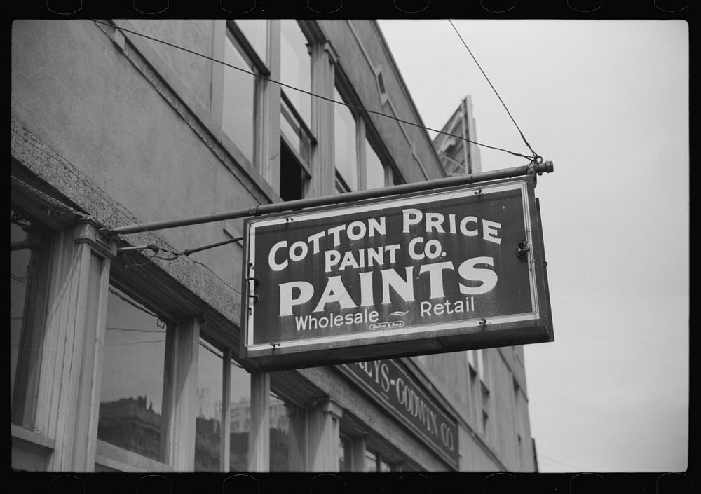 Signs on office building on Cotton Row, Front Street, Memphis, Tennessee. Sourced from the Library of Congress.