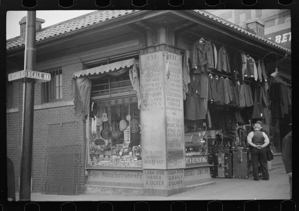 Pawn shop and secondhand clothing store on Beale Street, Memphis, Tennessee. Sourced from the Library of Congress.