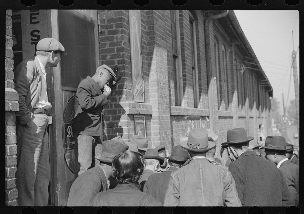 Crowds outside tobacco warehouse, Durham, North Carolina. Sourced from the Library of Congress.