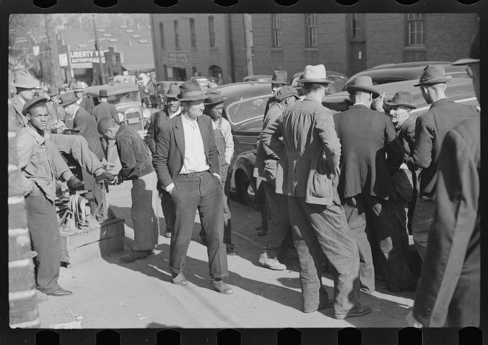 [Untitled photo, possibly related to: Crowds outside tobacco warehouse, Durham, North Carolina]. Sourced from the Library of…