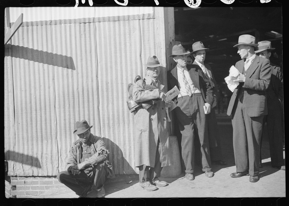 Selling shoes outside tobacco warehouse during auction sales, Durham, North Carolina. Sourced from the Library of Congress.