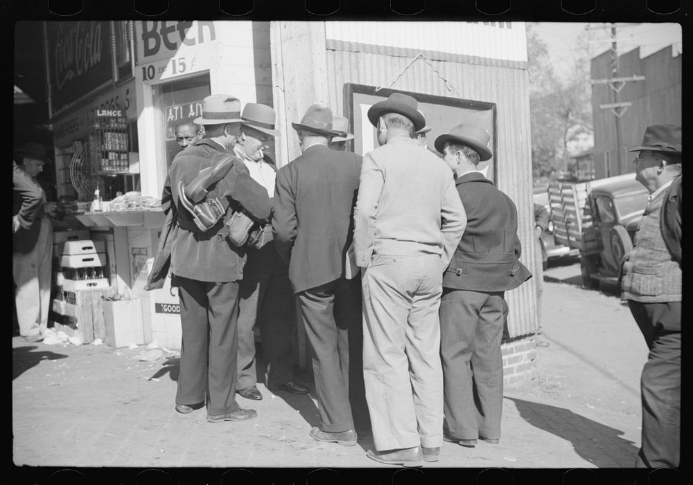 [Untitled photo, possibly related to: Selling shoes to farmers outside warehouse during tobacco auction, Durham, North…