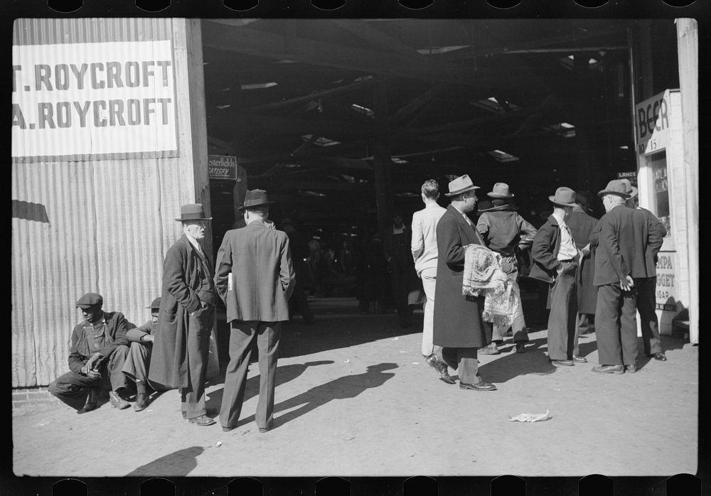 Selling scarves and table covers outside warehouse during tobacco auction, Durham, North Carolina. Sourced from the Library…