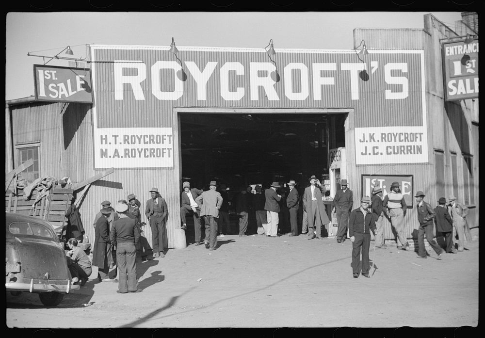 Entrance to tobacco warehouse during auction sales. Durham, North Carolina. Sourced from the Library of Congress.