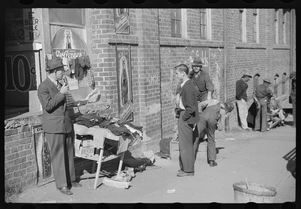 Selling socks and neckties outside tobacco warehouse, Durham, North Carolina. Sourced from the Library of Congress.