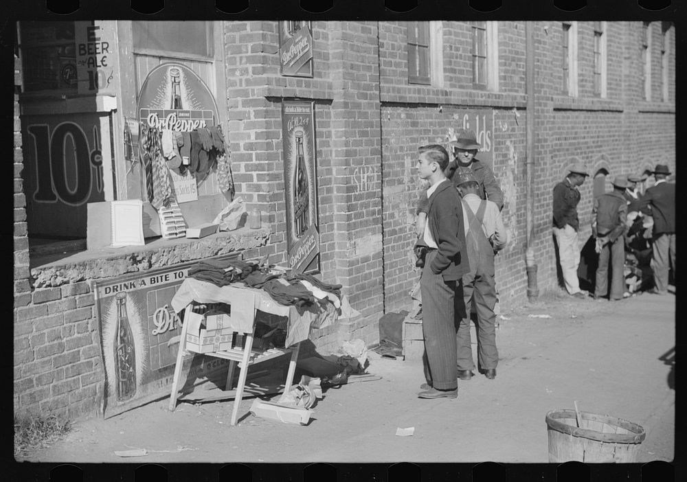 [Untitled photo, possibly related to: Selling socks and neckties outside tobacco warehouse, Durham, North Carolina]. Sourced…