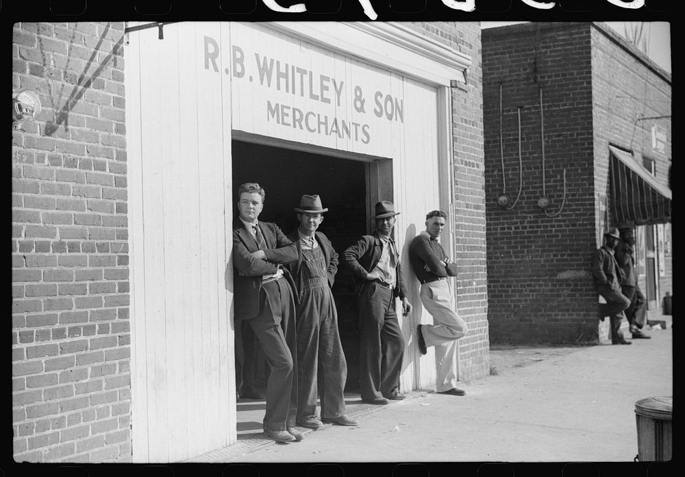 Men standing around outside general store, Wendell, Wake County, North Carolina. Sourced from the Library of Congress.