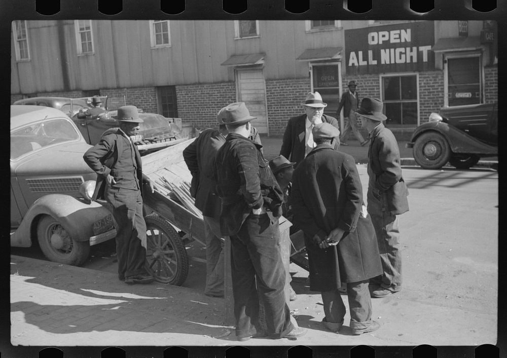 [Untitled photo, possibly related to: Outside tobacco warehouse after auction sale. Durham, North Carolina]. Sourced from…