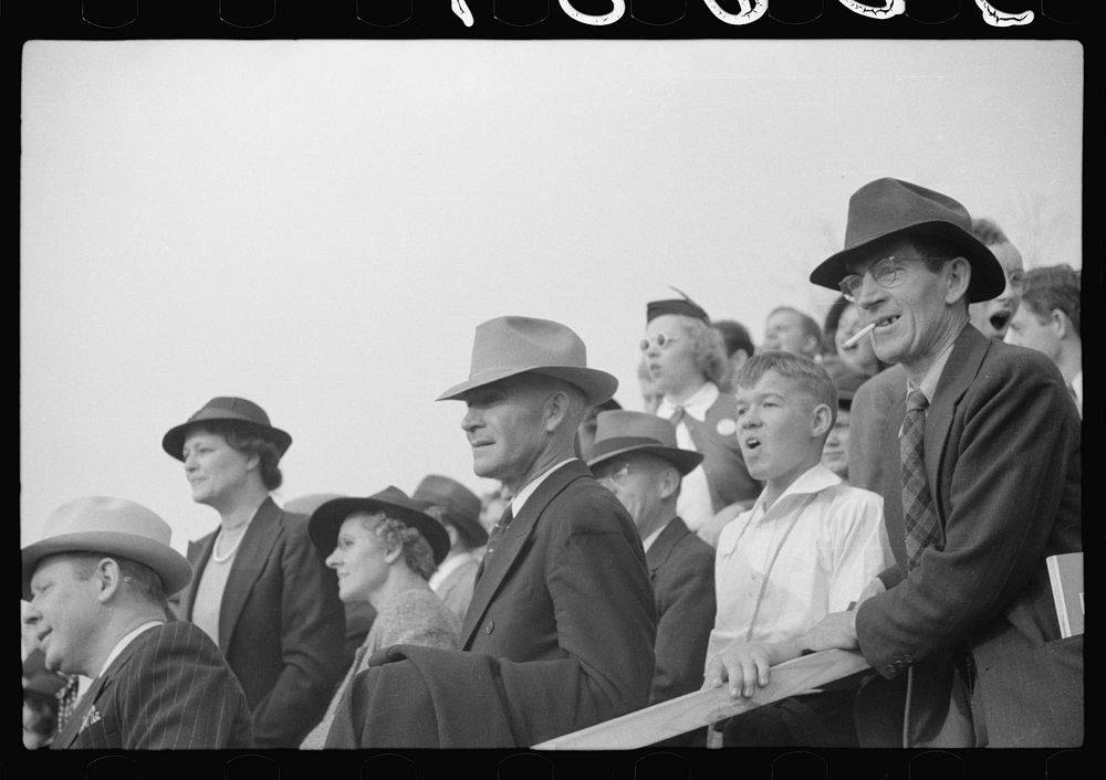 [Untitled photo, possibly related to: Spectators at the Duke University-North Carolina football game. Durham, North…