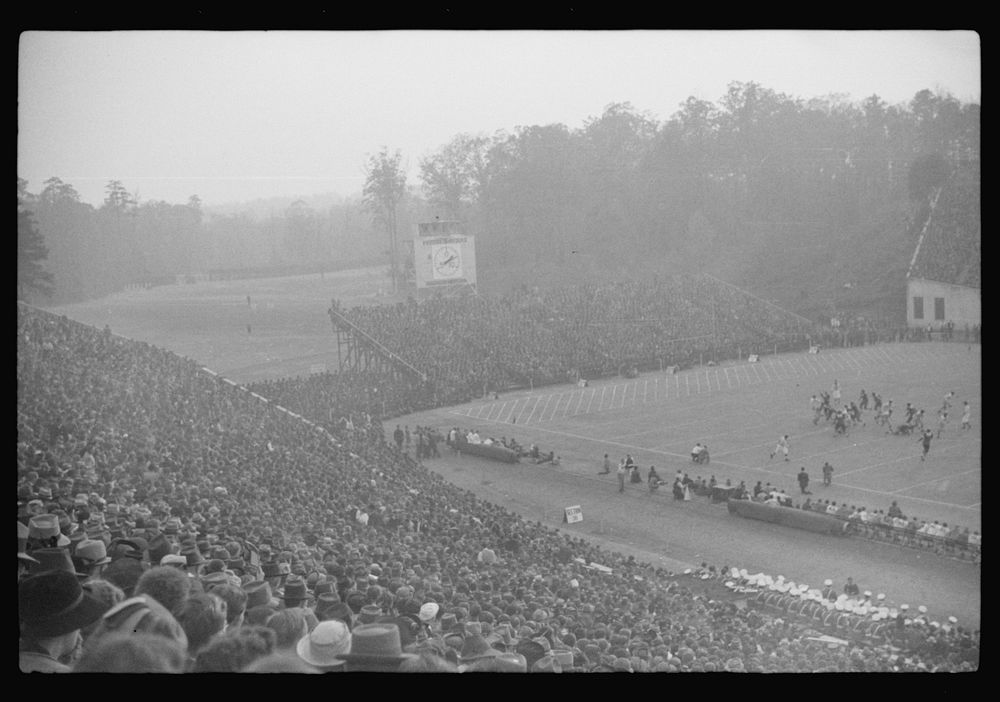 [Untitled photo, possibly related to: Spectators at the Duke University-North Carolina football game. Durham, North…
