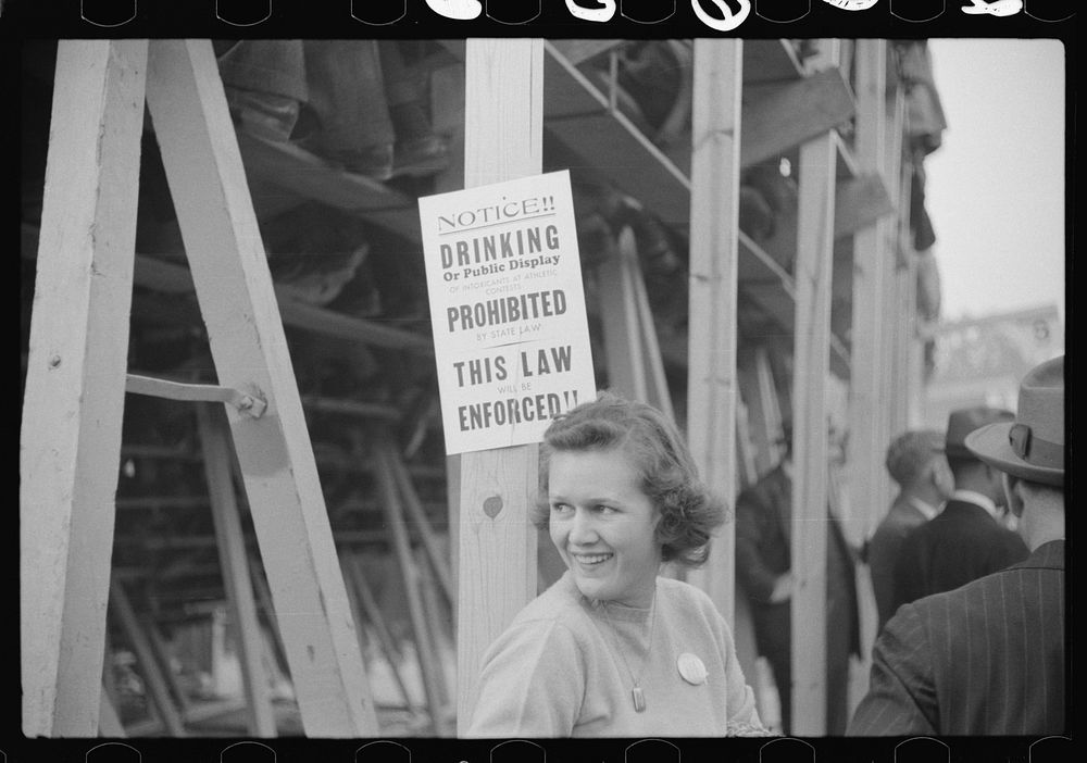 Sign posted at Duke University-North Carolina football game. Durham, North Carolina. Sourced from the Library of Congress.