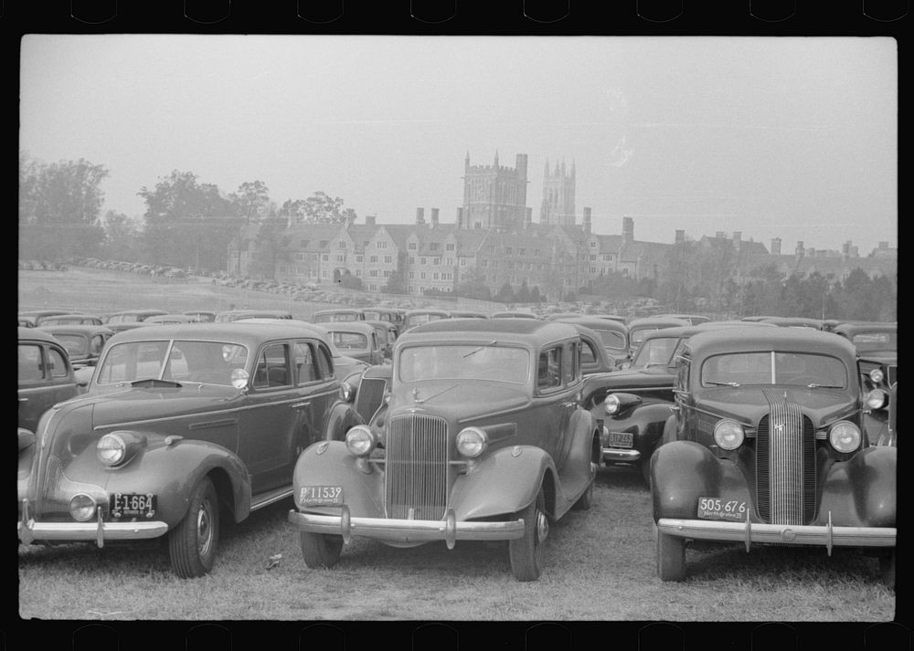 [Untitled photo, possibly related to: Cars parked outside the stadium at the Duke University-North Carolina football game.…