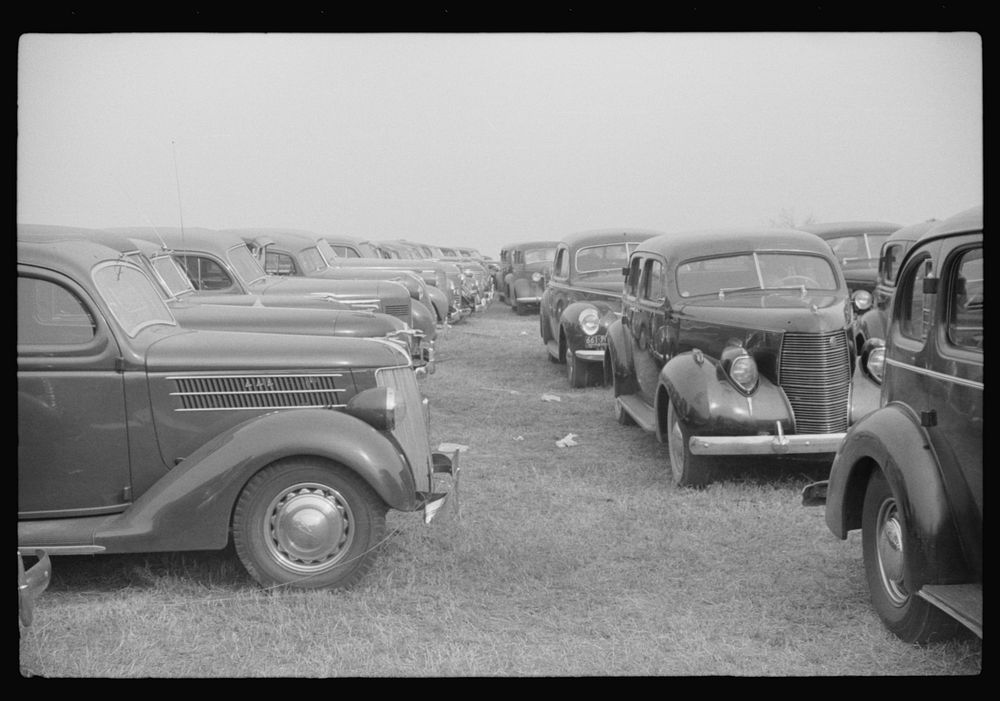 [Untitled photo, possibly related to: Cars parked outside the stadium at the Duke University-North Carolina football game.…