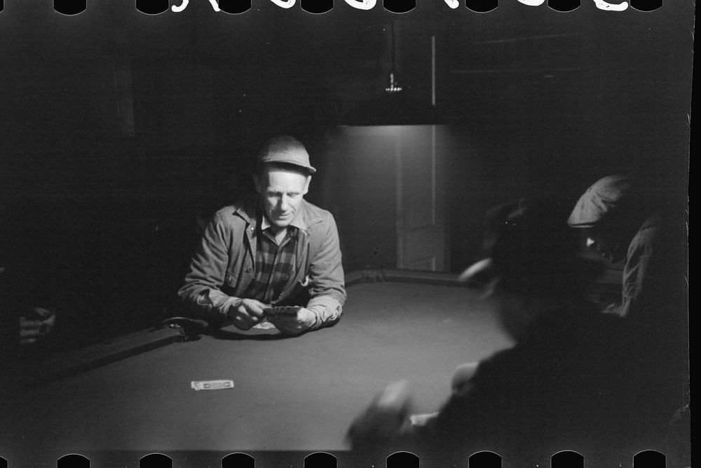 [Untitled photo, possibly related to: Farmers playing cards on a winter morning, Woodstock, Vermont]. Sourced from the…