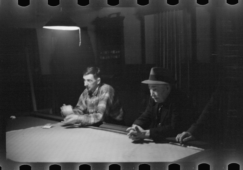 [Untitled photo, possibly related to: Farmers playing cards on a winter morning, Woodstock, Vermont]. Sourced from the…