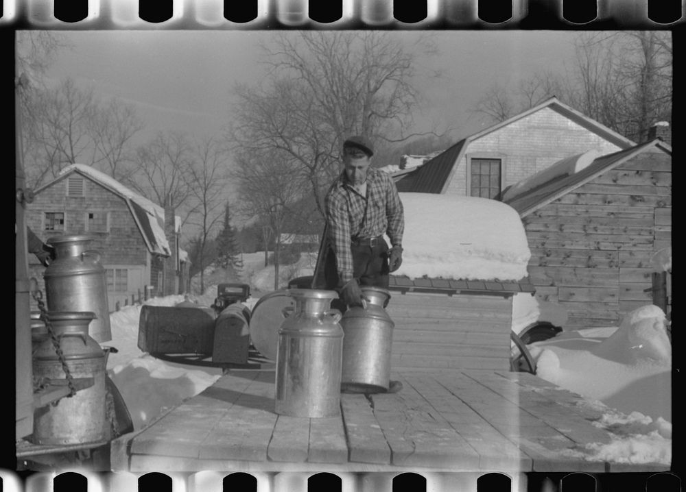 Farmers near Woodstock, Vermont, bring their cans of milk to the crossroads early every morning where it is picked up by the…