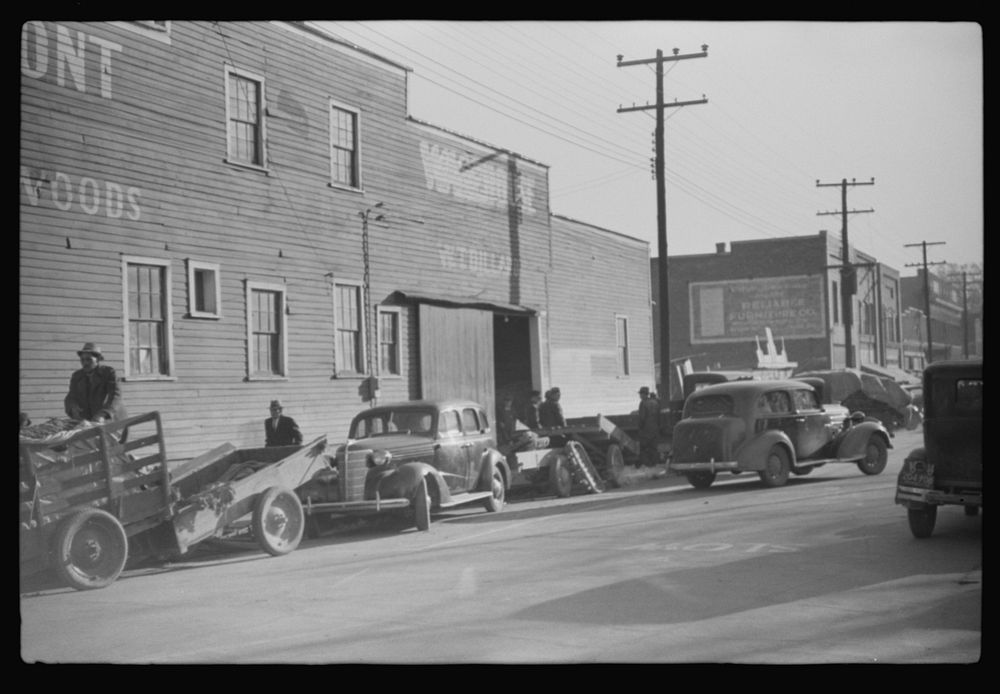[Untitled photo, possibly related to: Cars belonging to farmers loaded with tobacco which is being brought to warehouse for…