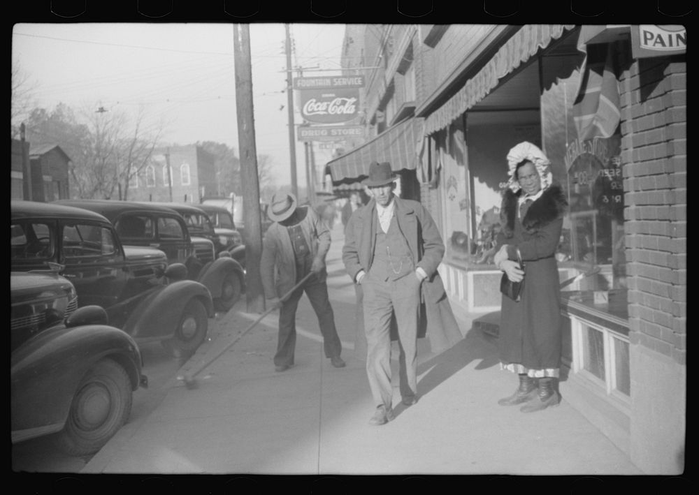 [Untitled photo, possibly related to: Street in Mebane, North Carolina in morning before tobacco auction sale]. Sourced from…