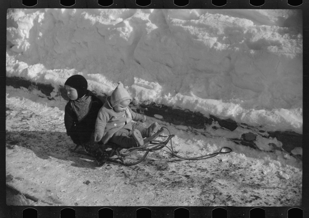 [Untitled photo, possibly related to: Children ride on sleds almost all winter. Woodstock, Vermont]. Sourced from the…