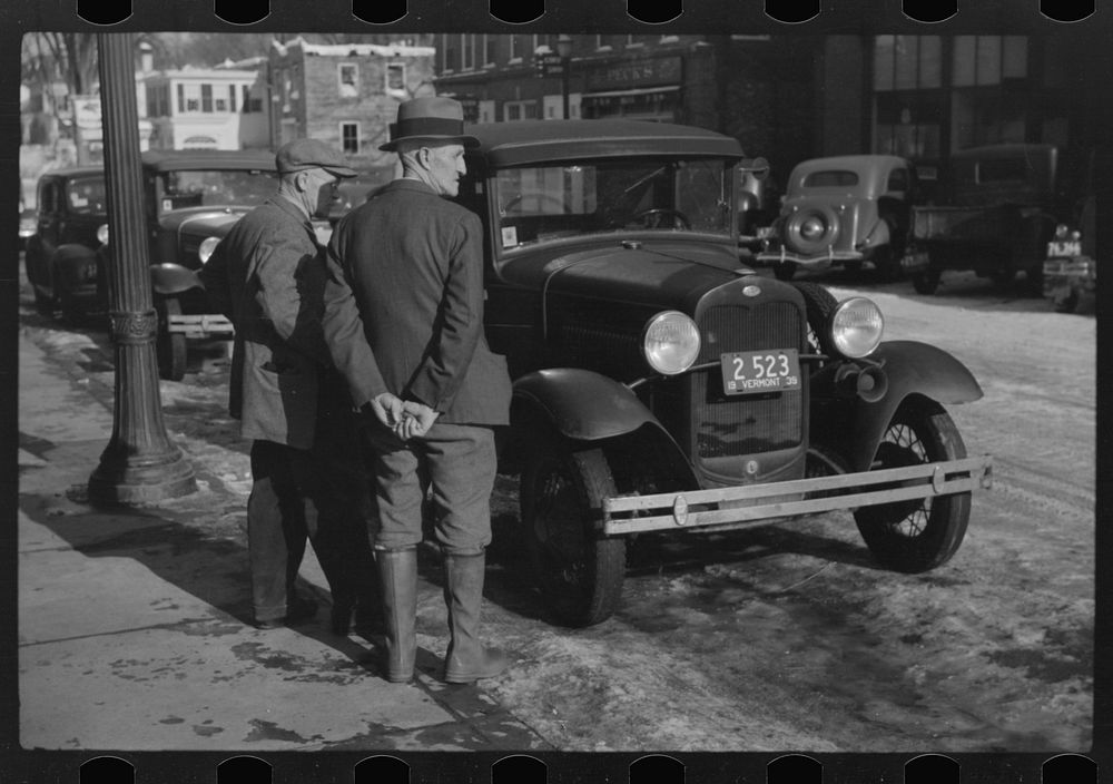 Townspeople of Woodstock, Vermont, discussing the severe winter on the street corner in center of town. Sourced from the…