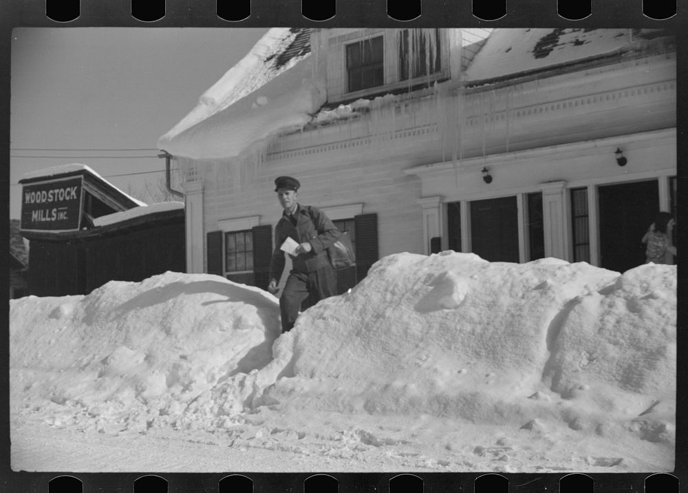 Woodstock, Vermont(?). Mailman making deliveries after a heavy snowfall. Sourced from the Library of Congress.