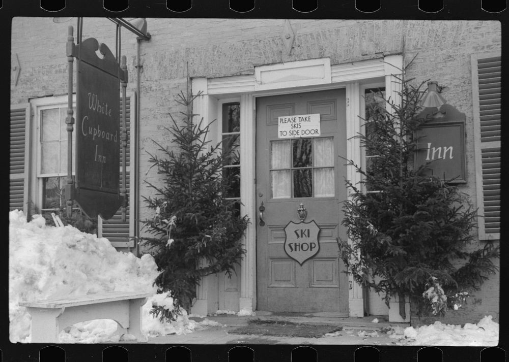 Front door of white Cupboard Inn, old home converted into tavern for winter and summer visitors. Woodstock, Vermont. Sourced…