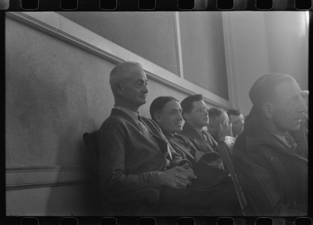 Townspeople listening to discussion during town meeting, Woodstock, Vermont. Sourced from the Library of Congress.