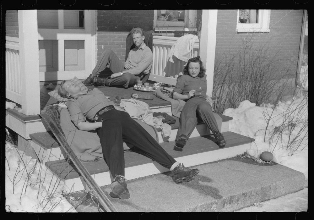 [Untitled photo, possibly related to: Skiers on porch of Mr. Dickinson's home in Lisbon, Franconia, New Hampshire. He…