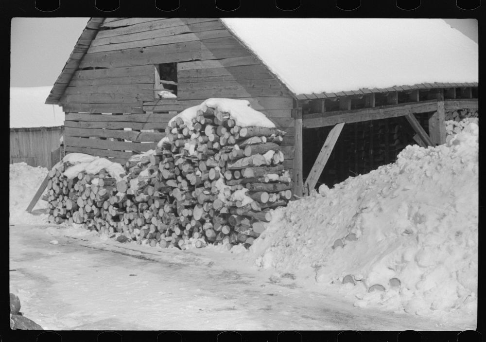 Logs for winter fuel on Mr. Dickinson's farm in Lisbon, near Franconia, New Hampshire. Sourced from the Library of Congress.