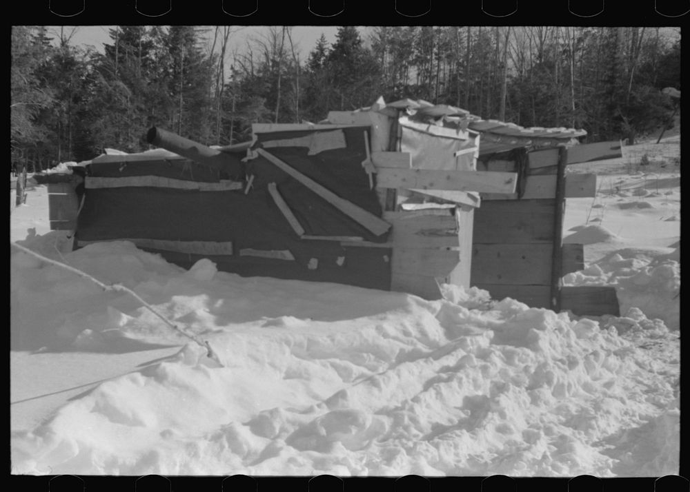 [Untitled photo, possibly related to: Lumbermen's shack where they can get warm, eat their lunch, and house the tractor with…