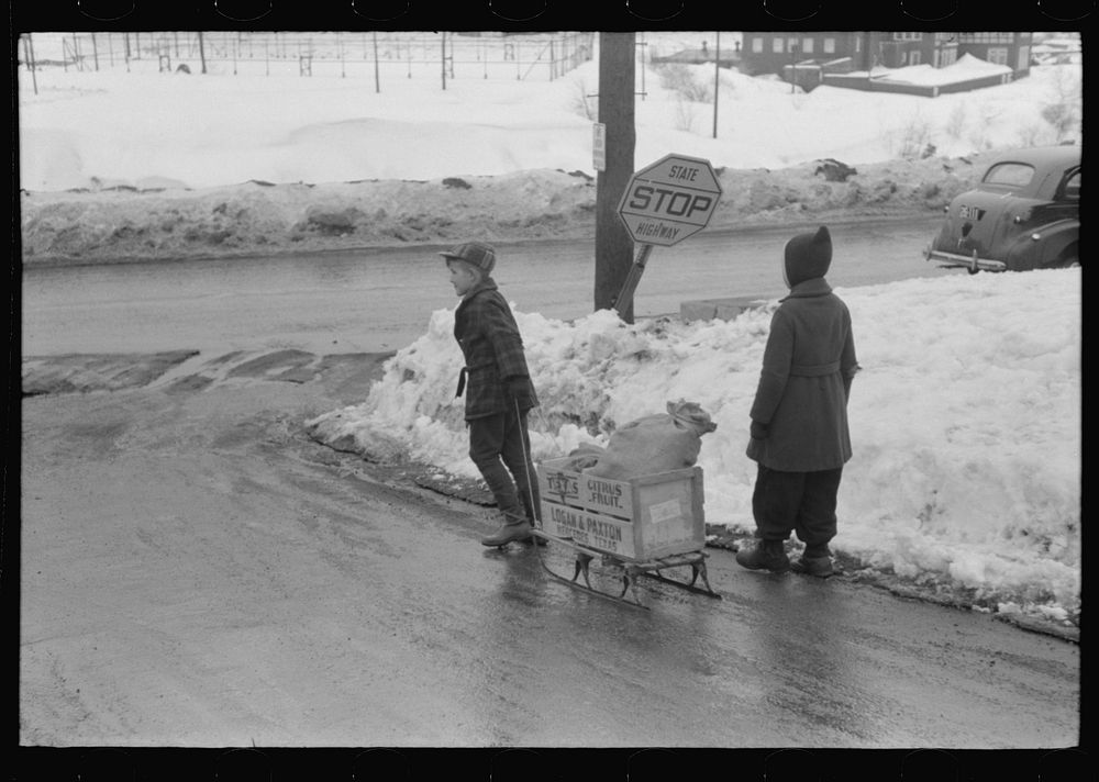 Berlin, New Hampshire. Children of paper mill workers bringing home groceries. The town is largely inhabited by French…