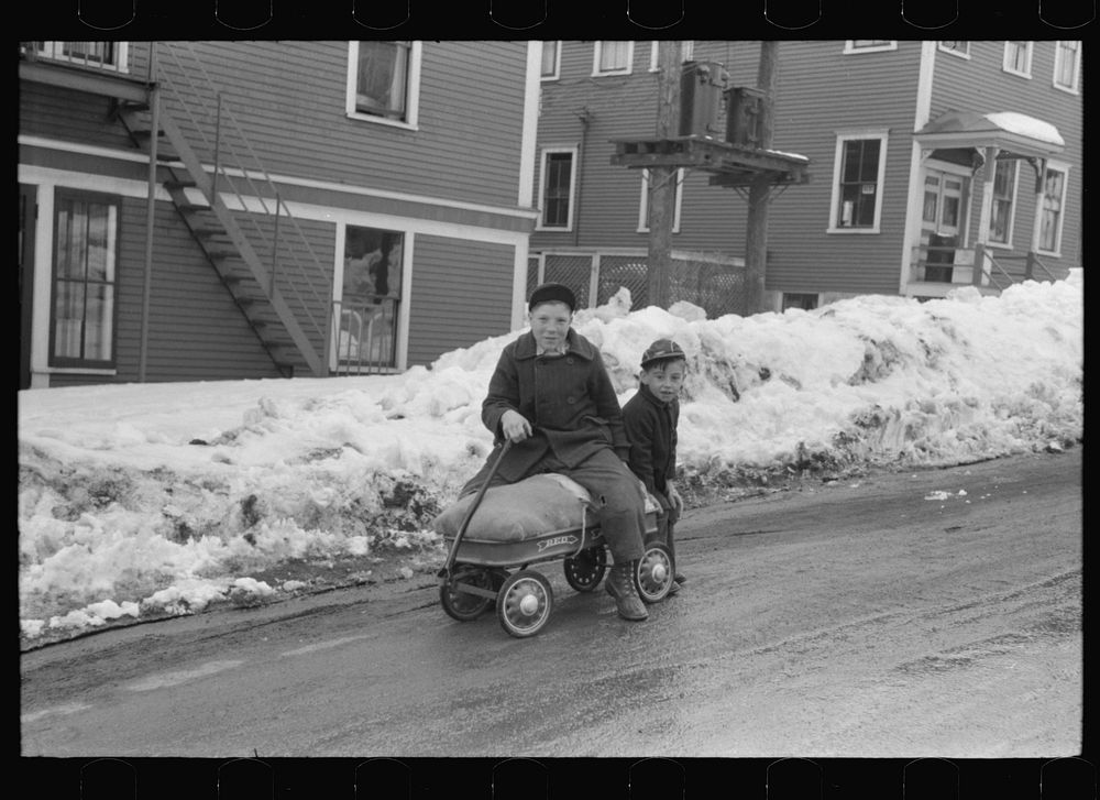 Children of paper mill workers bringing home groceries in Berlin, New Hampshire, largely inhabited by French Canadians and…