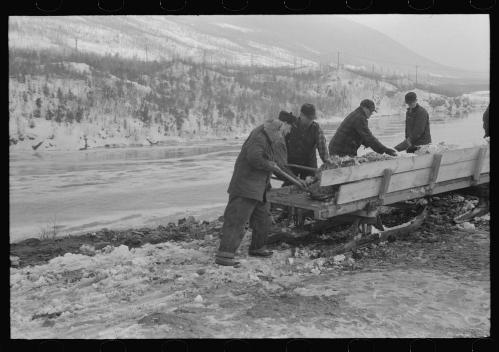 [Untitled photo, possibly related to: Workmen dumping the ice and snow from streets of Berlin, New Hampshire into river].…