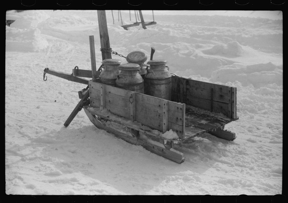 [Untitled photo, possibly related to: Hauling water in milk cans because usual source of supply is frozen. Putney Homestead…