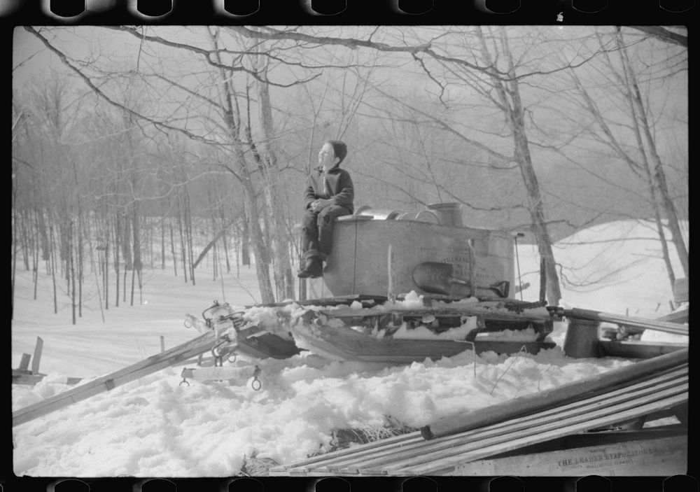 Mr. Shurtleff's child sitting on top of vat and sled in which sap for maple syrup is gathered. Bridgewater, near Woodstock…