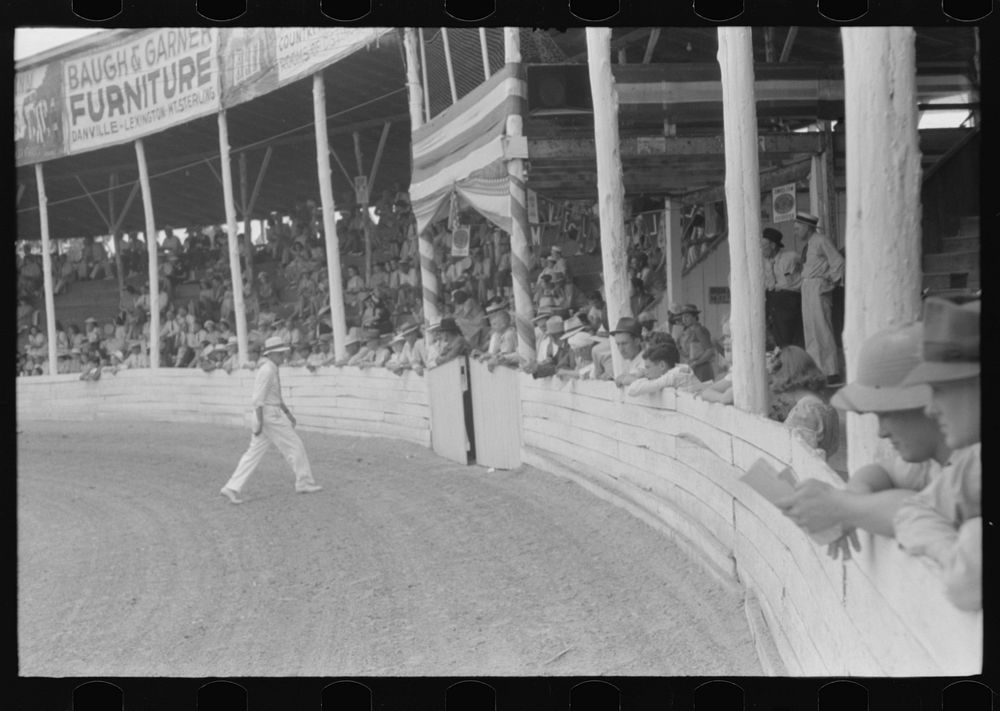 [Untitled photo, possibly related to: Spectators at Shelby County Horse Show and Fair. Shelbyville, Kentucky]. Sourced from…
