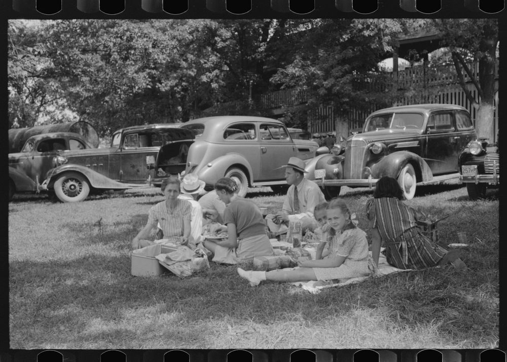 [Untitled photo, possibly related to: People at the Shelby County Horse Show and Fair eating a picnic lunch, Shelbyville…