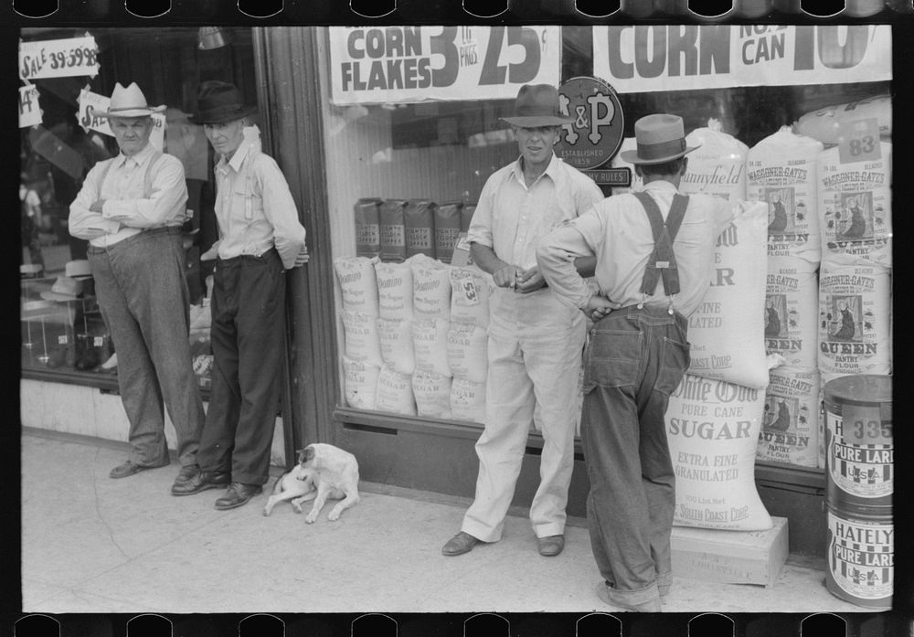 Farmers in front of store on Saturday afternoon in Cave City [actually Horse Cave], Kentucky. Sourced from the Library of…