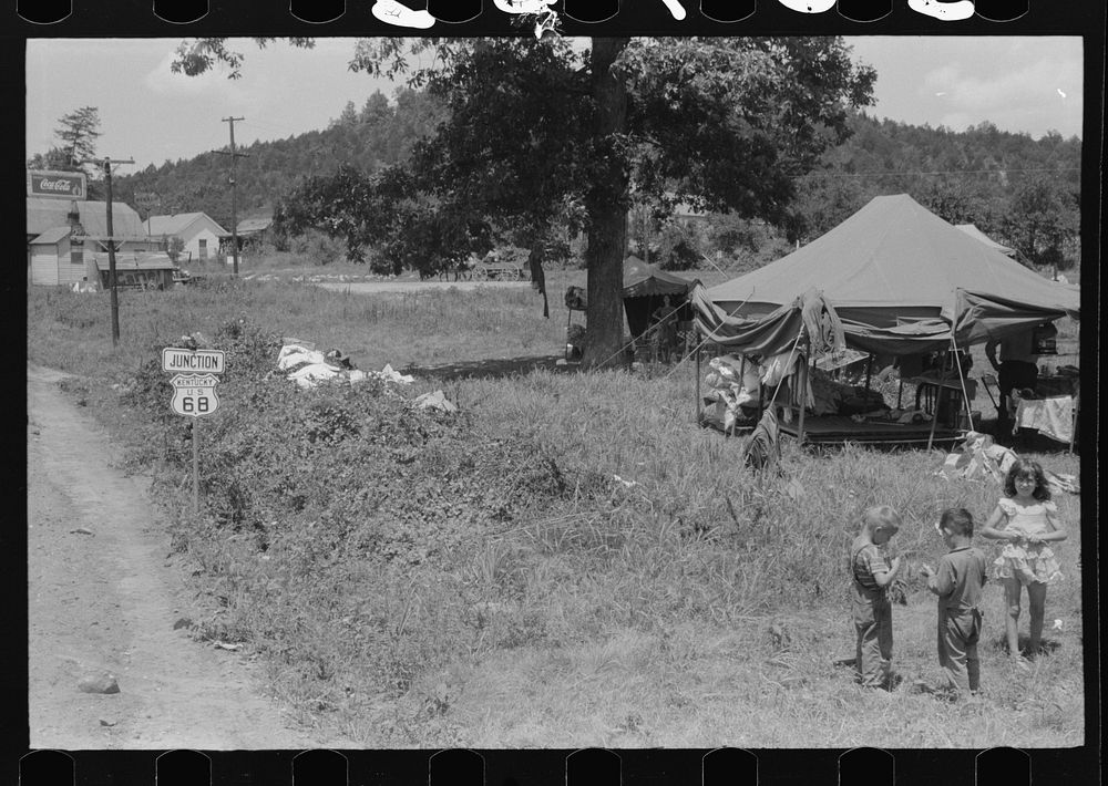 [Untitled photo, possibly related to: Itinerant repair man with family who goes around to the different farmers to mend…