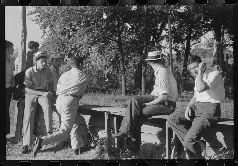 [Untitled photo, possibly related to: "Ball-throwing game" on the grounds of St. Thomas Church at a benefit picnic supper.…