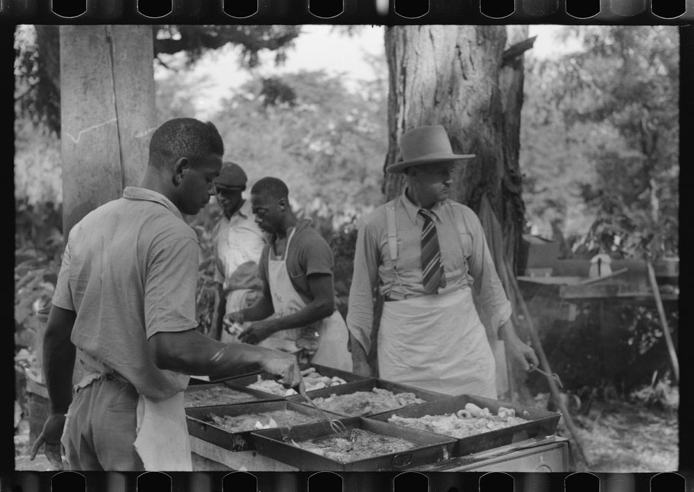 [Untitled photo, possibly related to: Cooking fried supper for a benefit picnic supper on the grounds of St. Thomas' Church.…