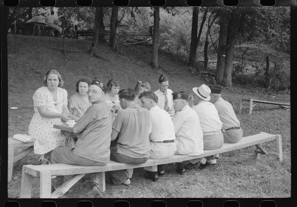 [Untitled photo, possibly related to: Legionnaires and their wives eating and drinking beer at American Legion fish fry…