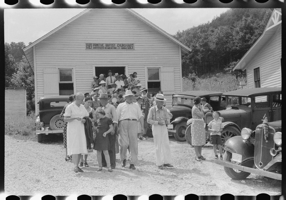 Mountain people leaving the Primitive Baptist Church in Morehead, Kentucky and going down to the creek for a baptizing.…