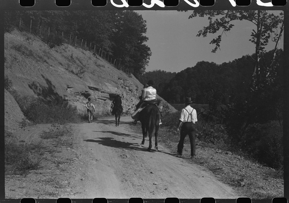 [Untitled photo, possibly related to: Relatives and friends of the family of the deceased going home from a memorial meeting…
