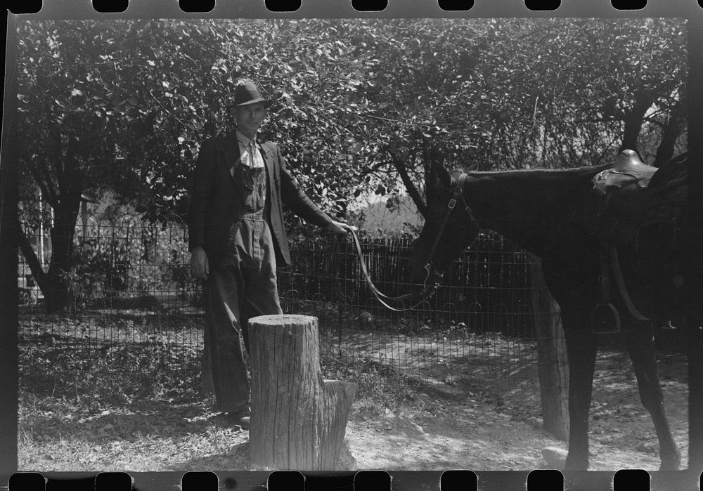 [Untitled photo, possibly related to: Woman using mounting block up Burton's Fork, Kentucky River, near Jackson, Kentucky].…
