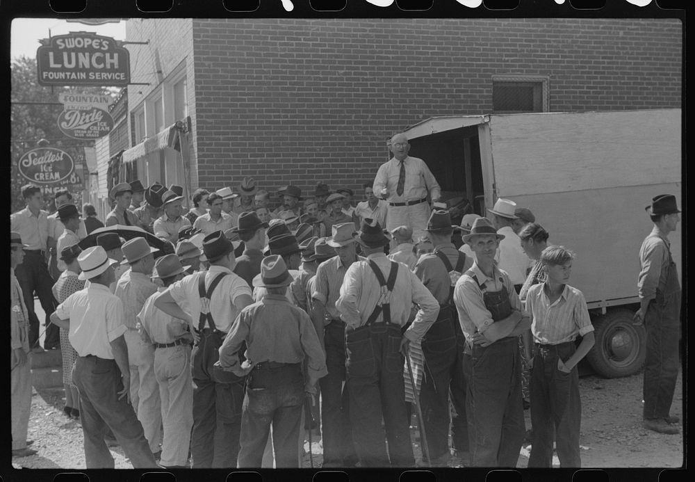Itinerant salesman haranguing crowd of farmers on court day, Campton, Kentucky. Sourced from the Library of Congress.