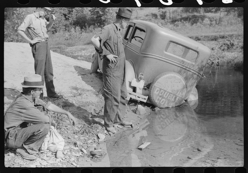 [Untitled photo, possibly related to: Mountaineers trying to get car out of creek. Up South fork of the Kentucky River…